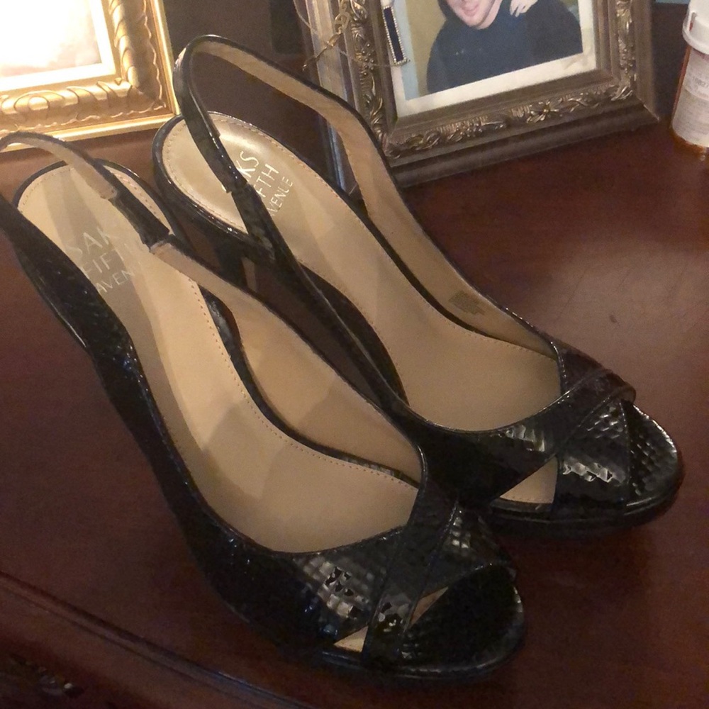 Saks Fifth Avenue leather with faux croc embossing. These are gorgeous.